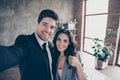 Photo of two partners making selfies in new workshop office raising thumb up dressed formal wear suits Royalty Free Stock Photo