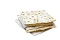 A photo of two pieces of matzah or matza isolated on white background. Matzah for the Jewish Passover holidays. Place for text, co