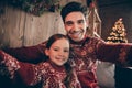 Photo of two positive people relatives take blog portrait record noel eve wear sweater in decorated x-mas home indoors