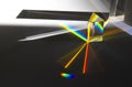 Photo of two triangular Prisms dispersing sun beam splitting into a spectrum on white background Royalty Free Stock Photo
