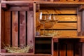 Photo of two wine glasses in wooden boxes. Royalty Free Stock Photo