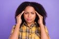 Photo of unhappy upset afro american woman hold hand head pain suffer trouble isolated on violet color background