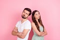 Photo of unsure millennial brown hair couple crossed arms look wear white t-shirt dress isolated on pink color backgound