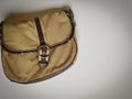 photo of used small sling bag in vintage background