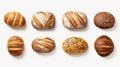 Photo of a variety of breads displayed on a clean white background