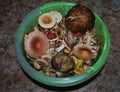 Various mushrooms in a bucket. Close-up.