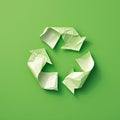 Photo Vibrant green background with white paper recycle symbol Royalty Free Stock Photo