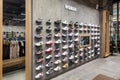 Minsk, Belarus - Nov 25, 2021: Photo of a view of a wall of sneakers inside the sports shop of shoes