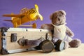 Photo of vintage toy plane and cute teddy bear Royalty Free Stock Photo