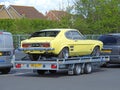 Vintage classic ford capri car on transporter vehicle lorry towed tow Royalty Free Stock Photo