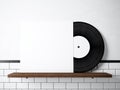 Photo vinyl music album template on natural wood bookshelf.White painted bricks wall background.Vintage style,high