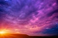 Photo of a violet sunset with clouds