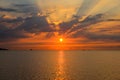 Background Seascape with The Sun, Clouds and Sun Rays at Beautiful Sunrise Royalty Free Stock Photo