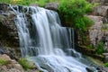 Photo of a waterfall taken at a long exposure. Waterfall wallpaper. Summer waterfall