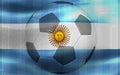 Photo of a waving Argentina flag with a football ball-shaped outline in the center Royalty Free Stock Photo