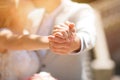 Photo of a wedding couple in the summer. Bride and groom hugging, hands, rings, wedding bouquet close-up and copy space Royalty Free Stock Photo