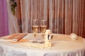 photo wedding decor, filled glasses, cushion for rings, indoors Royalty Free Stock Photo