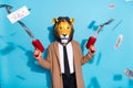Photo of weird authentic guy wear lion mask shoot pistol billion dollars salary earnings isolated over blue color