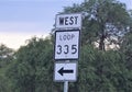 A photo of the West loop 335 road sign in Texas