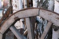 Old wooden wheel of the cart as a decoration for the room Royalty Free Stock Photo