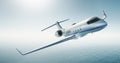 Photo of white luxury generic design private jet flying over the sea. Empty blue sky at background. Business travel