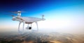 Photo White Matte Generic Design Air Drone with action camera Flying Sky under Earth Surface.Uninhabited Desert Royalty Free Stock Photo