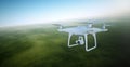 Photo White Matte Generic Design Air Drone with video action camera Flying Sky under the Earth Surface. Green Fields Royalty Free Stock Photo