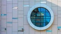Photo of white modern building with round window Royalty Free Stock Photo