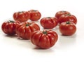 Marmande tomatoes on white table Royalty Free Stock Photo
