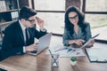 Photo of woman being coach teaching her student and future worker of her company to discern market tendencies