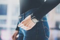 Photo Woman in Modern Loft Office,Wearing Generic Design Smart Watch.Soft Reflections on the Black Empty Screen Royalty Free Stock Photo