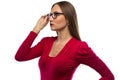 Photo of woman in red touching glasses Royalty Free Stock Photo