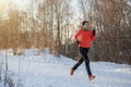 Photo of woman in sports uniform on morning run Royalty Free Stock Photo