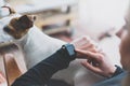 Photo Woman Working Modern loft,using generic design smart watch.Female Hands Touching screen smartwatch.Time brake Royalty Free Stock Photo