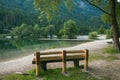 Photo of wooden bench near Jasna lake in Slovenia