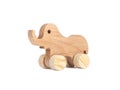 Photo of a wooden elephant on wheels of beech. Royalty Free Stock Photo