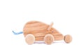 Photo of a wooden mouse on wheels of beech Royalty Free Stock Photo