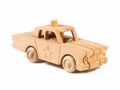 Photo of a wooden police car of beech. Royalty Free Stock Photo