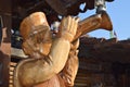 Wooden statue of a man with a trumpet Royalty Free Stock Photo