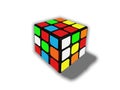 Photo of 3x3 unsolved scrambled Rubik's Cube on the white background.