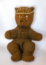 Photo of a 45-year-old bear with a homemade pearl crown on his head,handmade