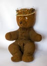 Photo of a 45-year-old bear with a homemade pearl crown on his head,handmade Royalty Free Stock Photo