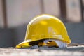 Photo Yellow hard hat safety helmet on construction site, essential gear Royalty Free Stock Photo