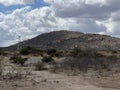 Semi arid vegetation with hills along Nairobi Mombasa highway Kenya, Africa Royalty Free Stock Photo