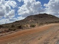 Semi arid vegetation with hills along Nairobi Mombasa highway Kenya, Africa Royalty Free Stock Photo