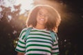 Photo of young adorable african school girl eyewear clever green trees free-time go college outdoors