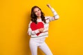 Photo of young adorable pretty nice woman wear striped pullover hold red paper heart gift love fist up isolated on Royalty Free Stock Photo