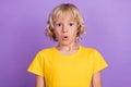 Photo of young amazed shocked astonished boy sale news reaction face isolated on purple color background Royalty Free Stock Photo