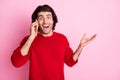 Photo of young arabian man happy positive smile excited tall cellphone good news isolated over pastel color background