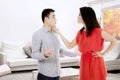 Asian couple arguing in the living room Royalty Free Stock Photo